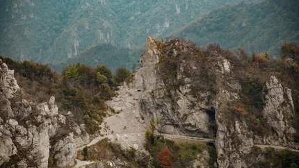 Tremalzo © David Karg Cyclists on a mountain forest path with rocks and caves