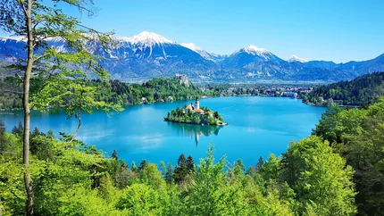 TOUR TO LAKE BLED © Ribno Alpine Resort - Katarina Strgar View of Lake Bled with island and snowy mountains in the background