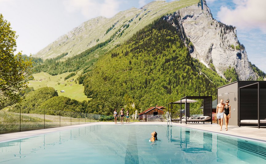 Alpen Hotel Post **** © Hof 437 Swimming pool with mountain backdrop and people in swimwear