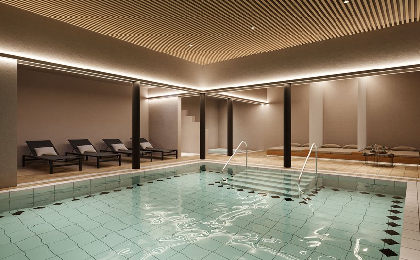 Alpen Hotel Post **** © Hof 437 Indoor pool with loungers and warm lighting in a spa area